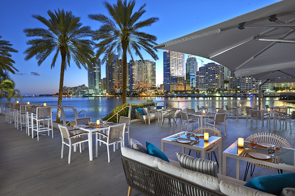 La Mar terrace with a waterfront view