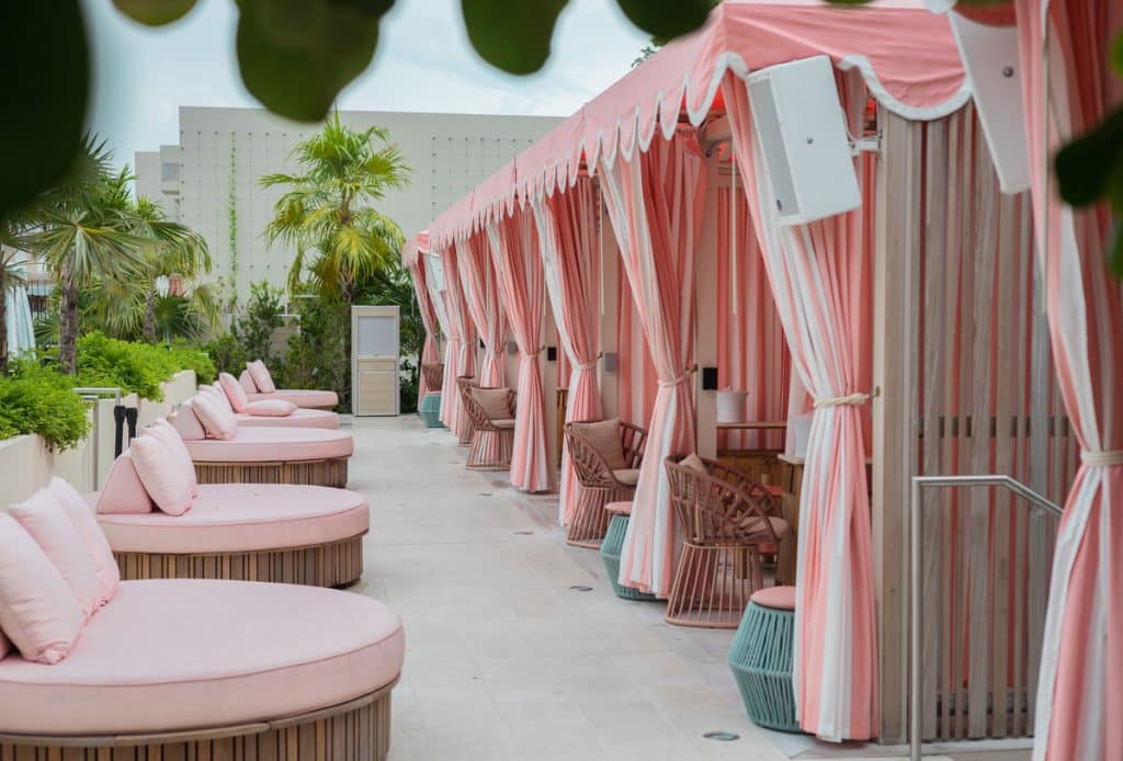 Pink and white cabanas at the Goodtime Hotel in Miami Beach