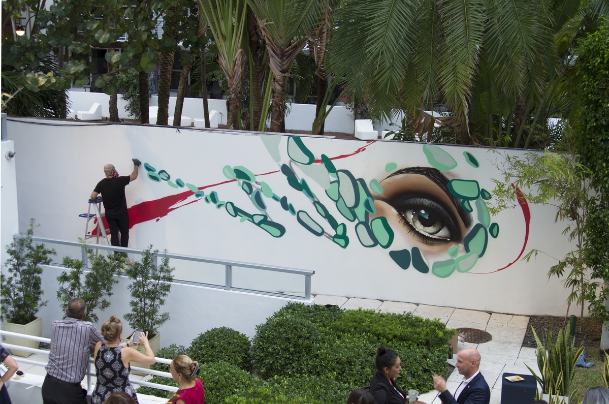 Artist painting the walls of the Sagamore South Beach