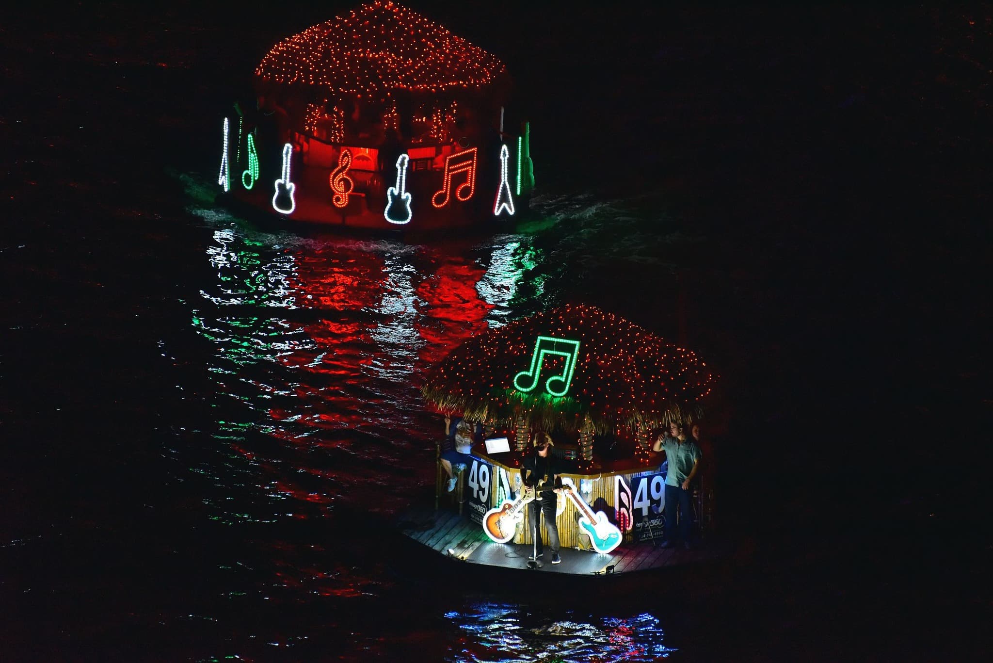 Winterfest Boat Parade floating tikis