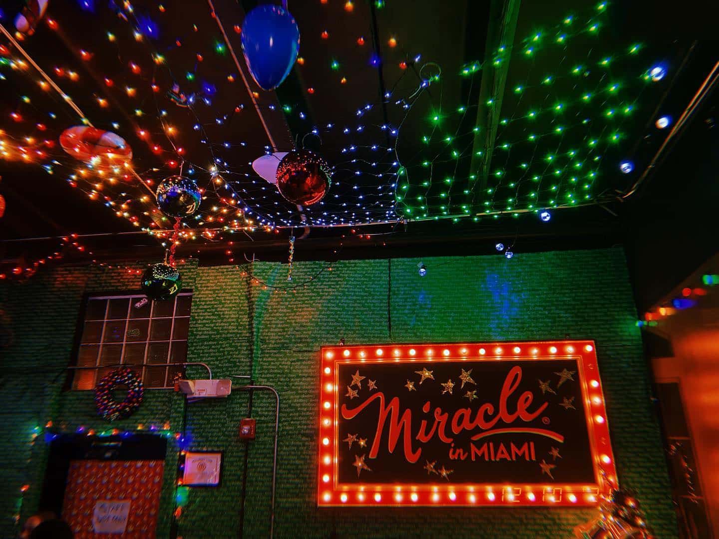 Miracle in Miami at Gramps sign and twinkling decor