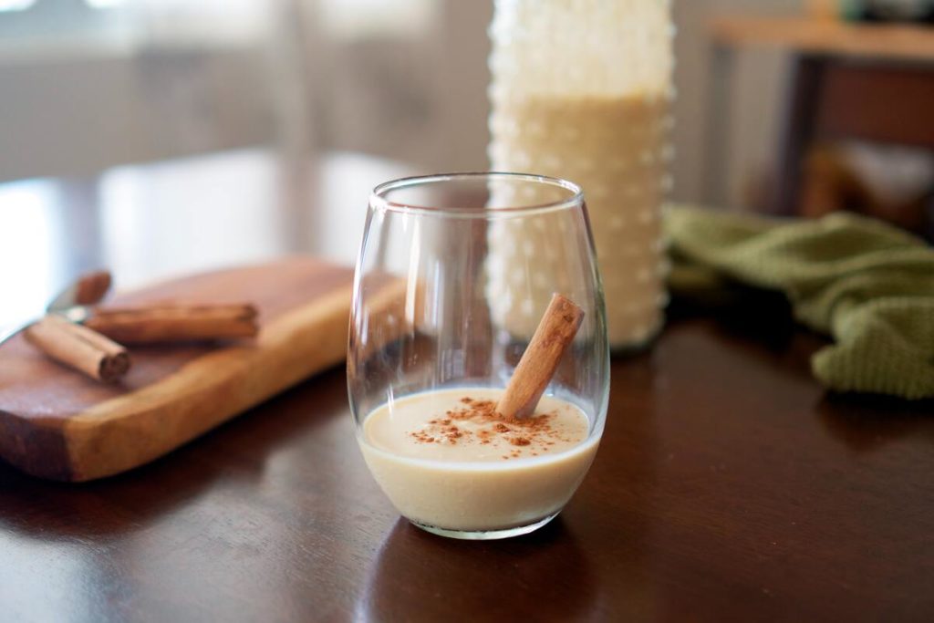 A cup of coquito on a table