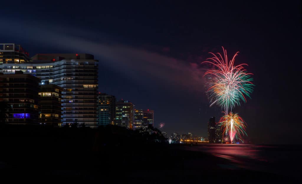 New year firework celebration over the beach