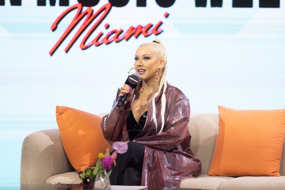 Christina Aguilera speaks onstage during the Premiere Party at Billboard Latin Music Week 2022 