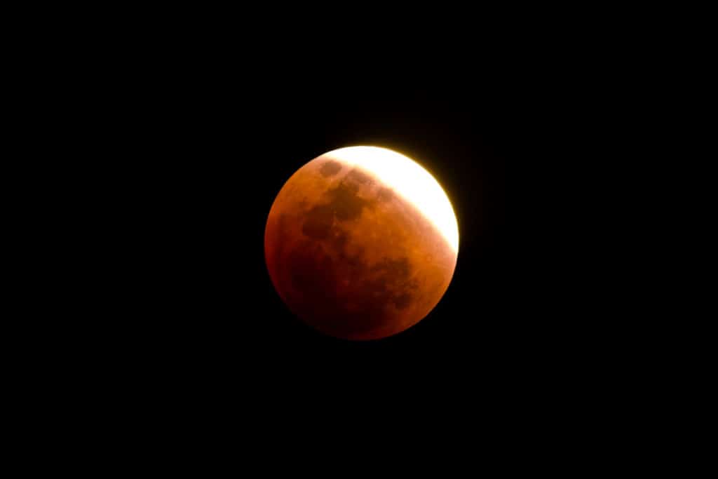 Moon appears blood red for a lunar eclipse
