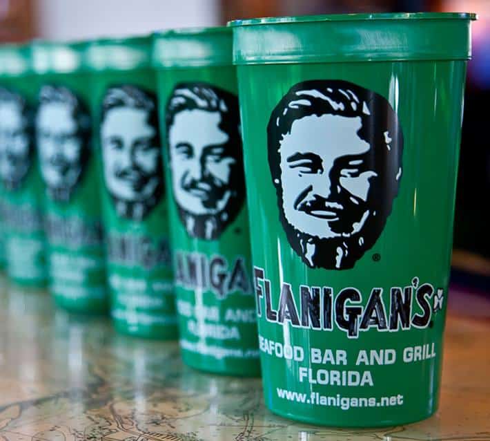 A row of green Flanigan's cups