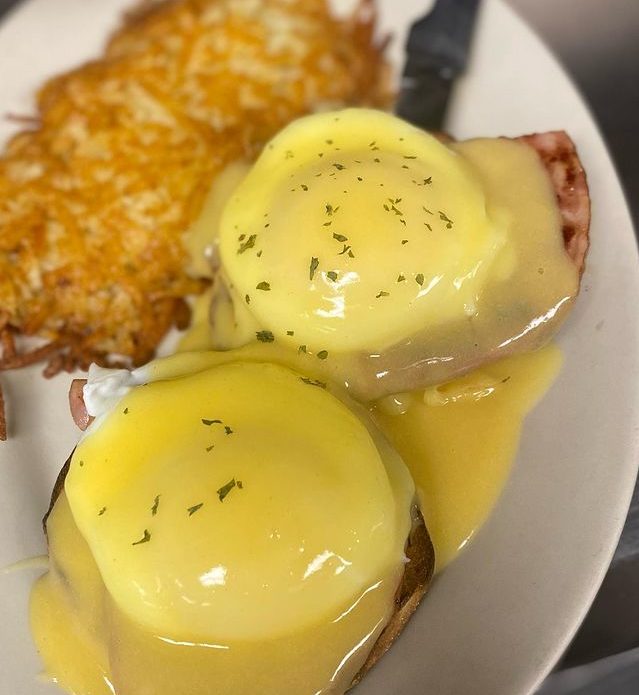 Eggs Benedict with hash browns at Royal Palm Grill