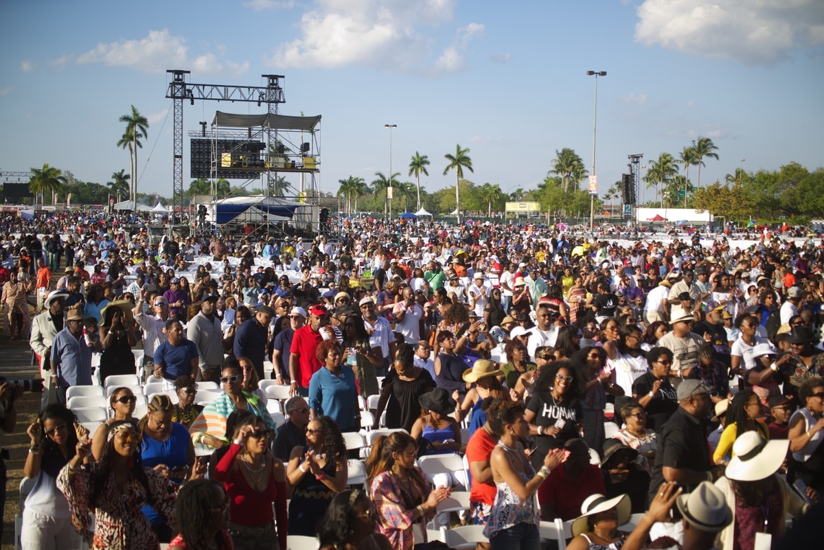 The crowd of 40K reacts to comedian Ricky Smiley at Jazz in the Gardens. JITG is a 2 Day music festival that takes place at Hard Rock Stadium