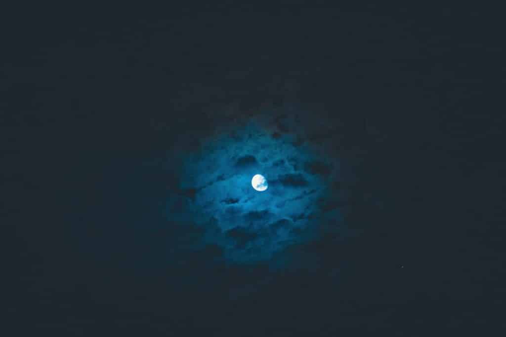 Blue cloudy moon
